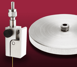 Fiber optic polishing puck and bare fiber chuck connected to an SMA bare fiber holder