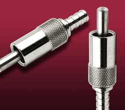 Two aluminum SMA 905 fiber optic connectors